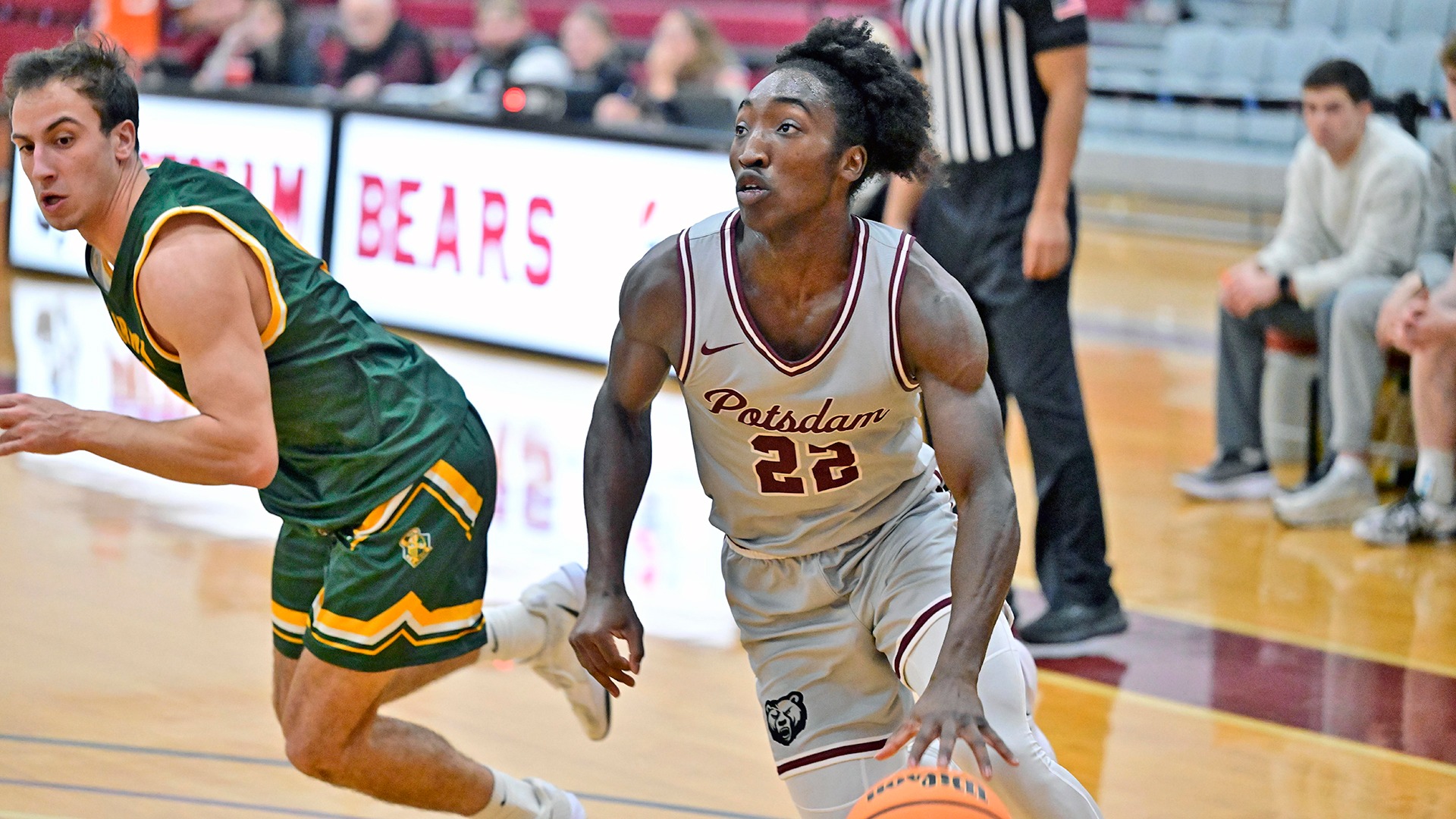 Bryson Brown drives to the basket against Clarkson on 11/25/25.