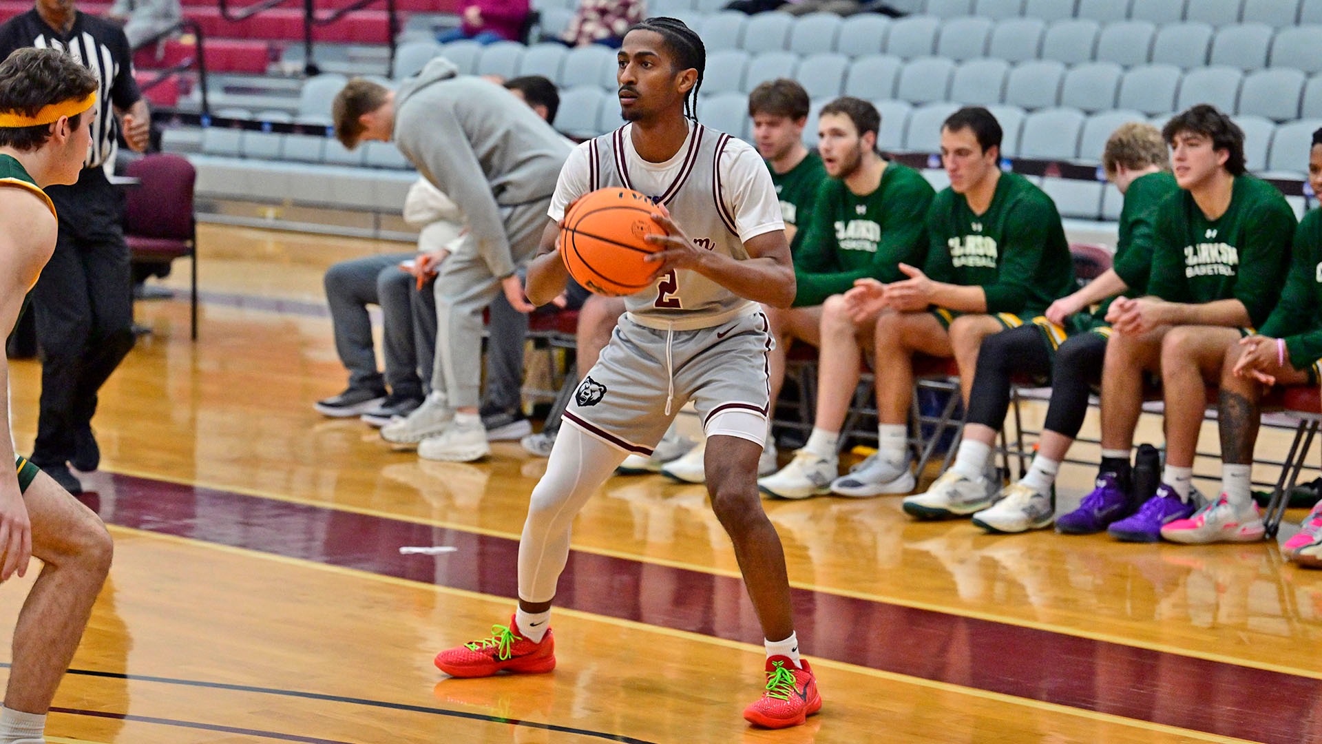 Jaylen Singh looks to pass the ball against Clarkson on 11/25/25.