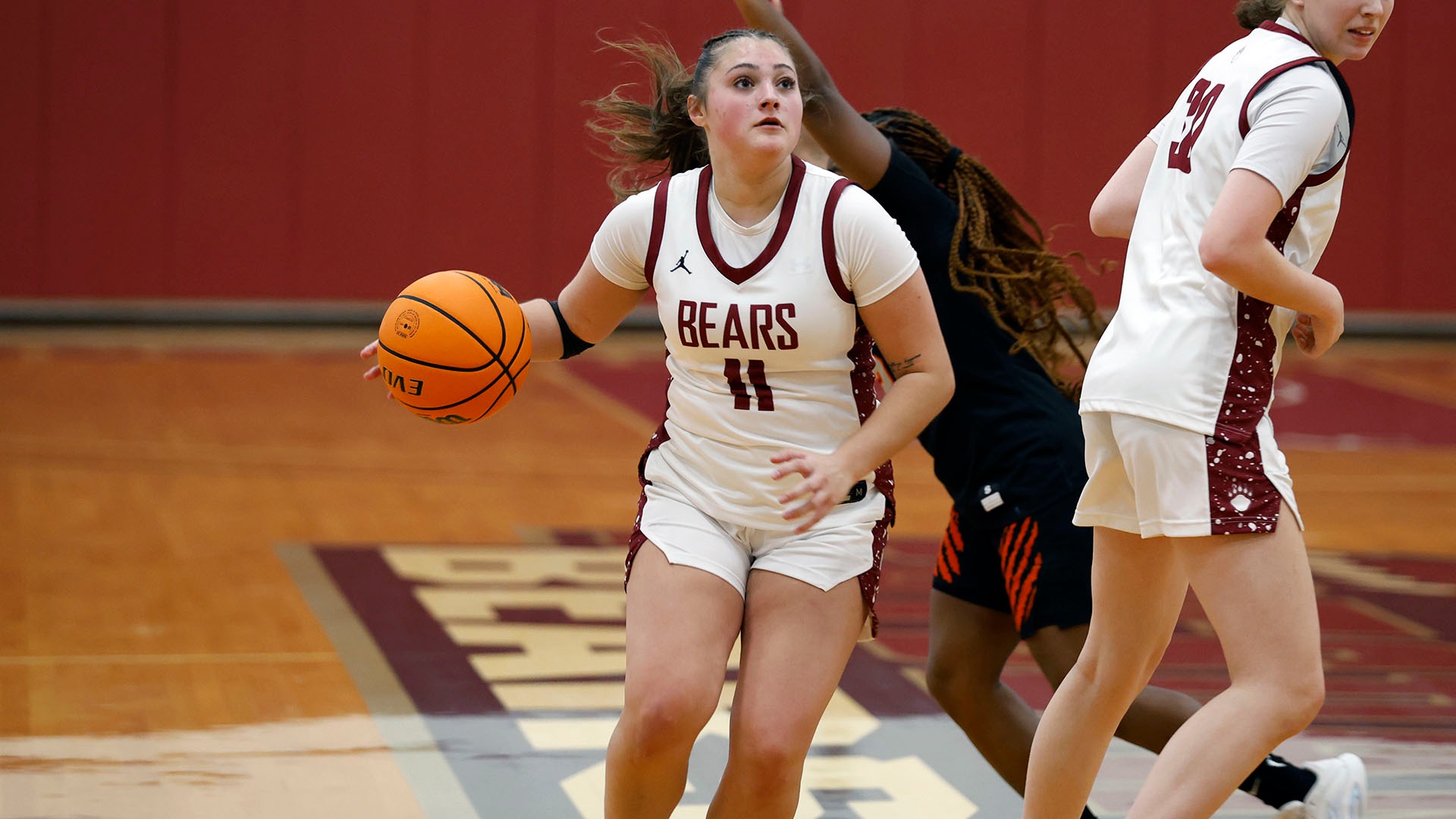 Olivia Cook drives to the basket against Buffalo State on 12/05/25.