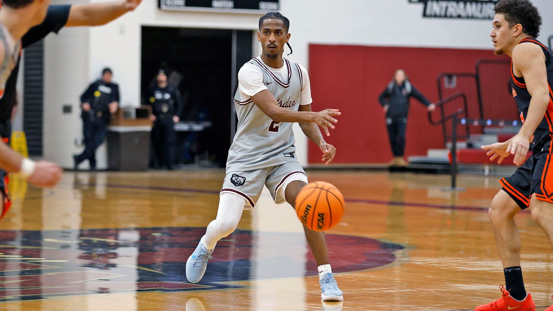 Jaylen Singh passes the ball against Buffalo State on 12/5/25.