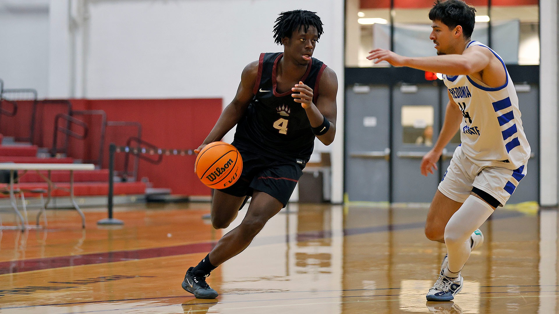 Timothy Hardy drives to the basketball against Fredonia on 12/6/25.