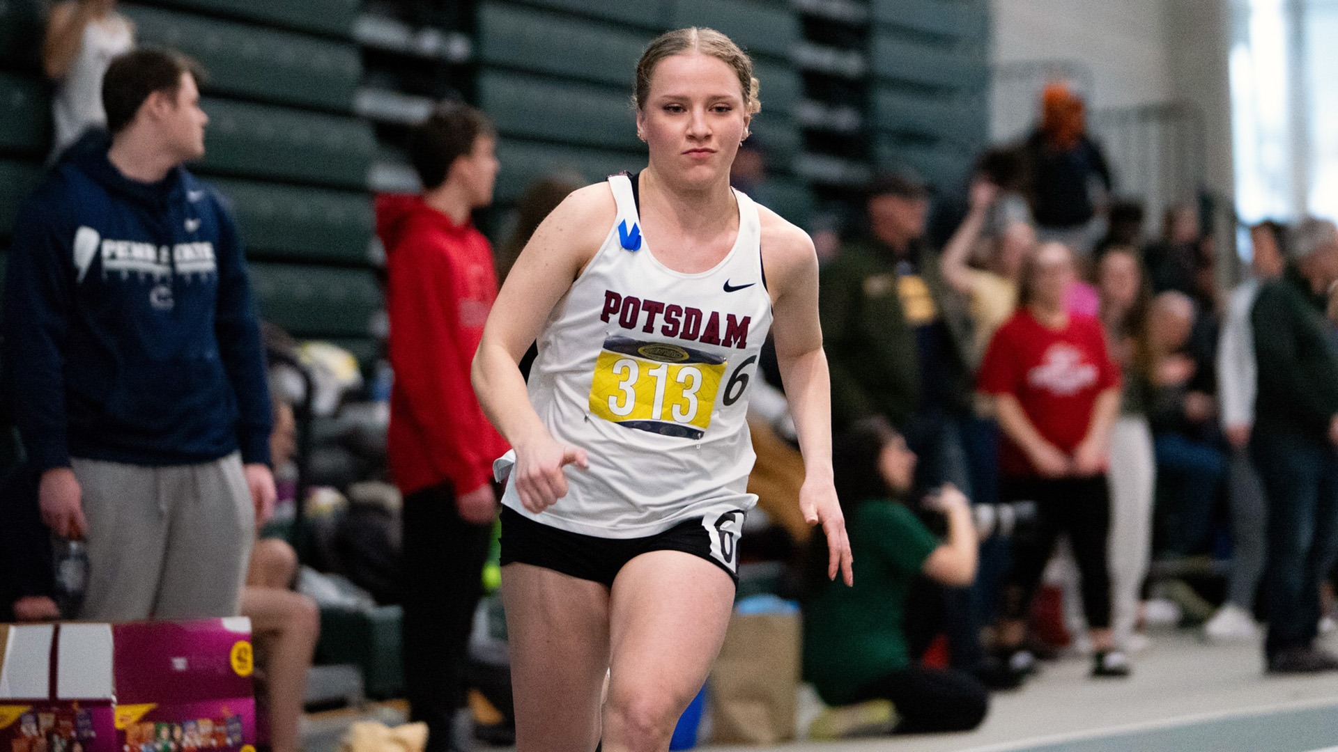Emily Yousey runs at the SUNYAC Indoor Track and Field Championships on March 1, 2025.