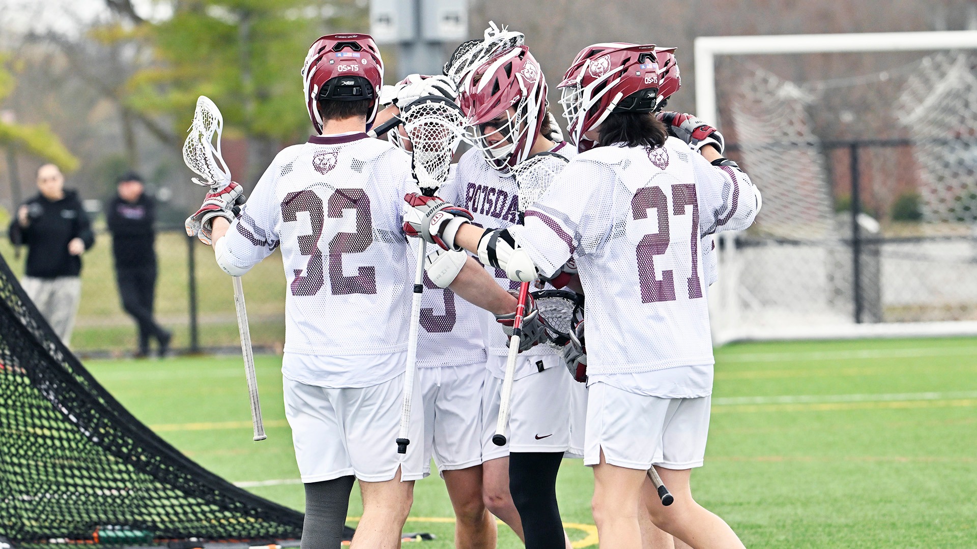The Bears celebrate a goal against Oneonta on 4/12/25.