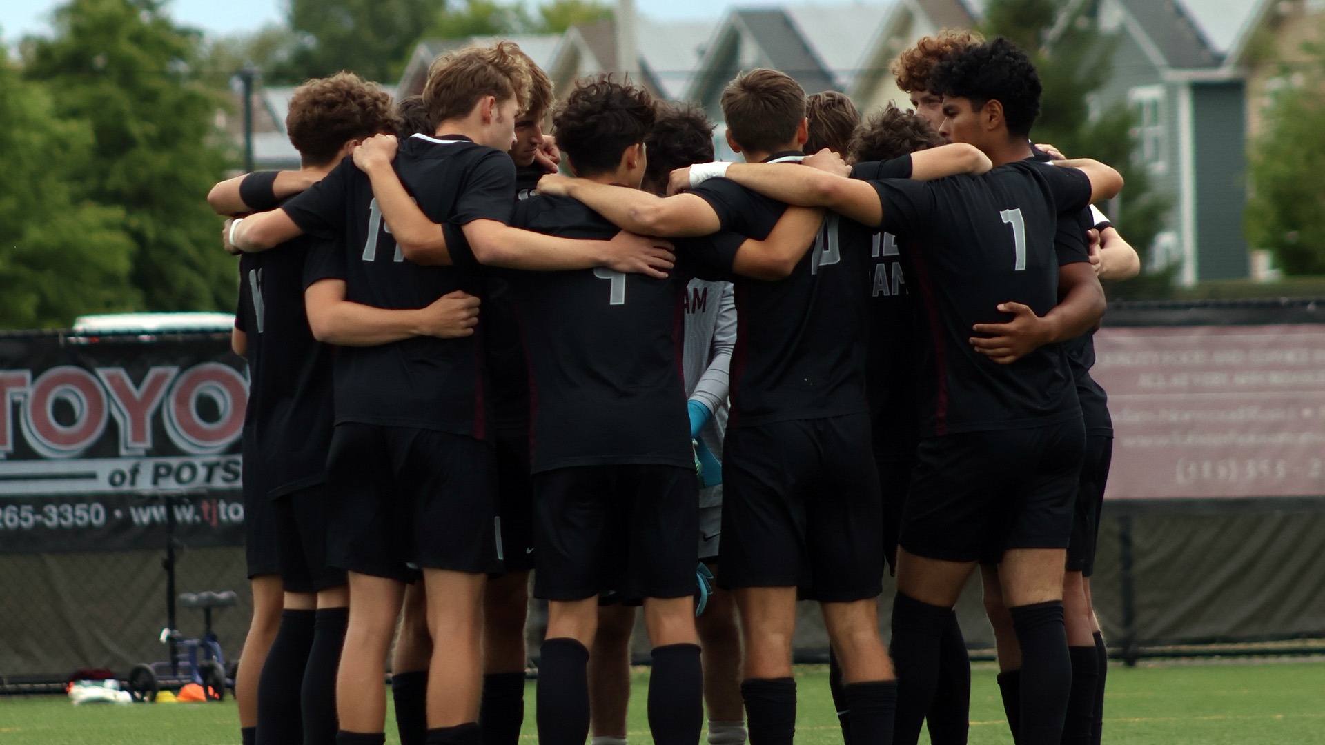 The men's soccer team huddles before the start of its match with Baruch on 8/30/25.