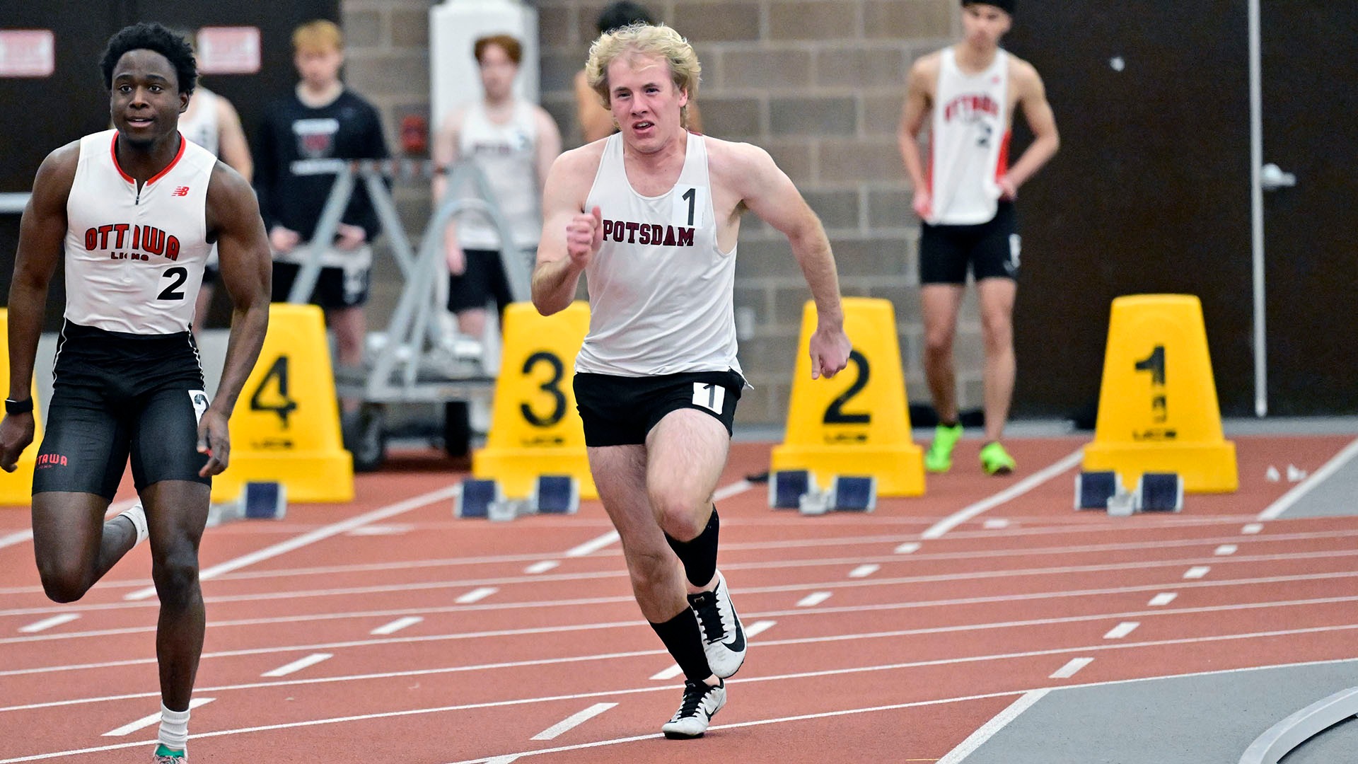 Jack Schoeder runs at SLU on 12/5/25.