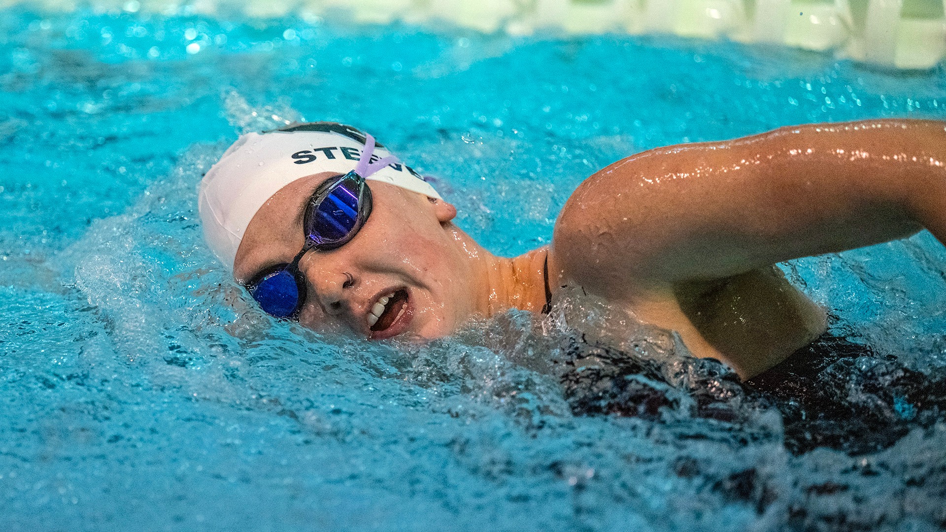 Katherine Steeves swims during the 2025-26 season.