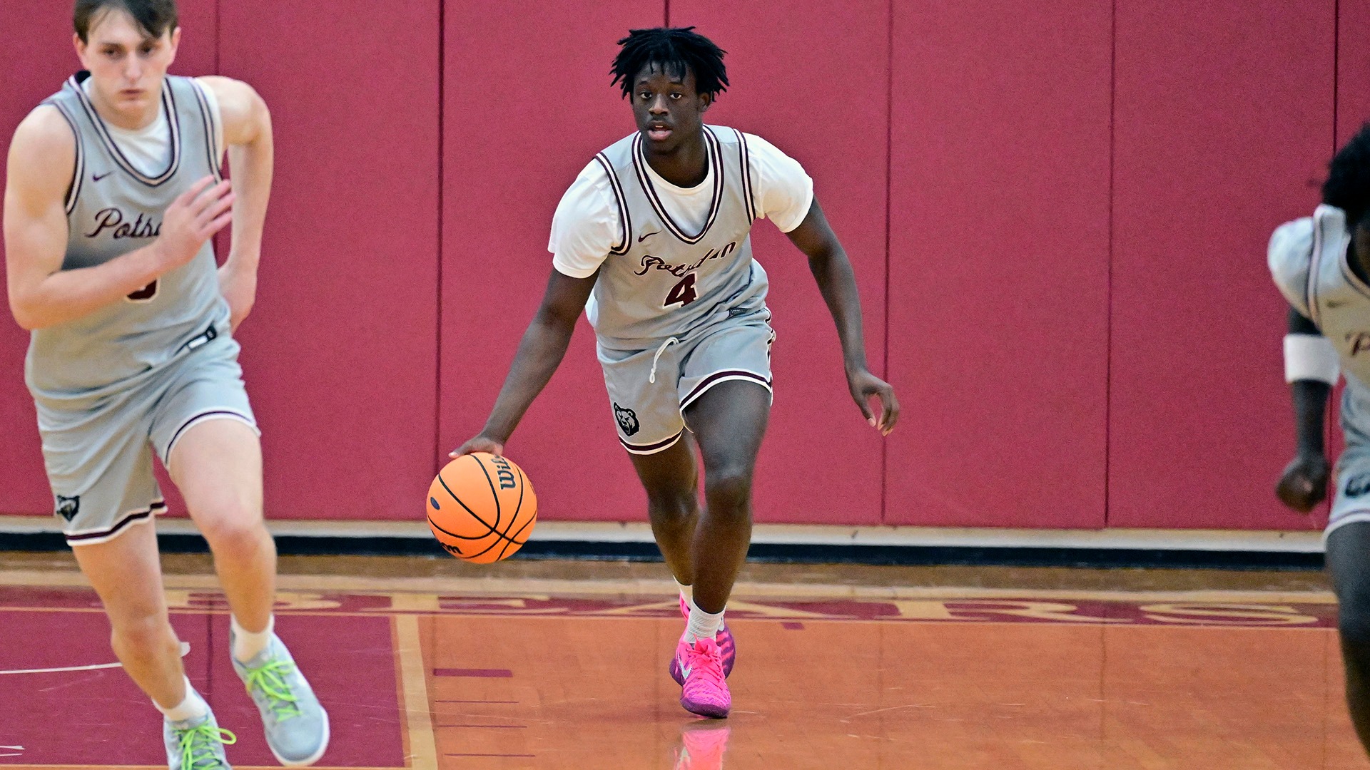 Timothy Hardy moves the ball up the court against Clarkson on 11/25/25.