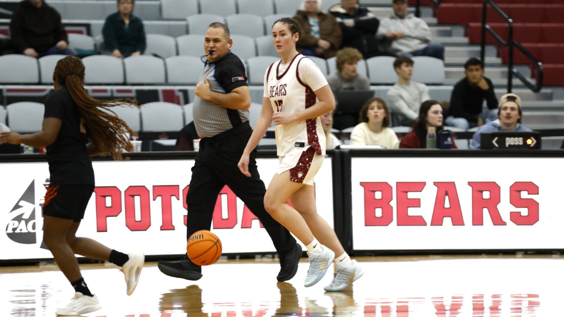 DaeLynn Alcock dribbles the ball up the floor against Buffalo State on December 5, 2025. 