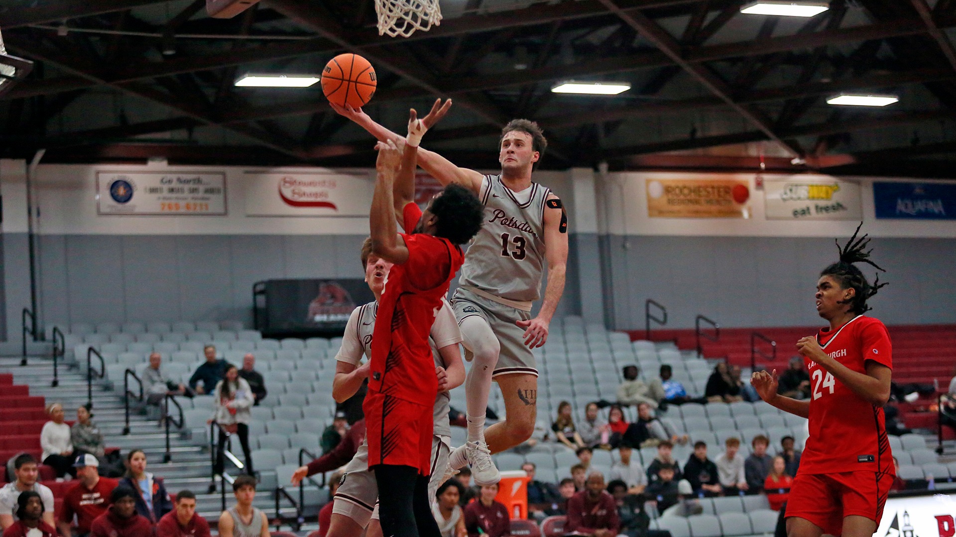 Mike Hancock scores on a layup against Plattsburgh on 1/27/26.