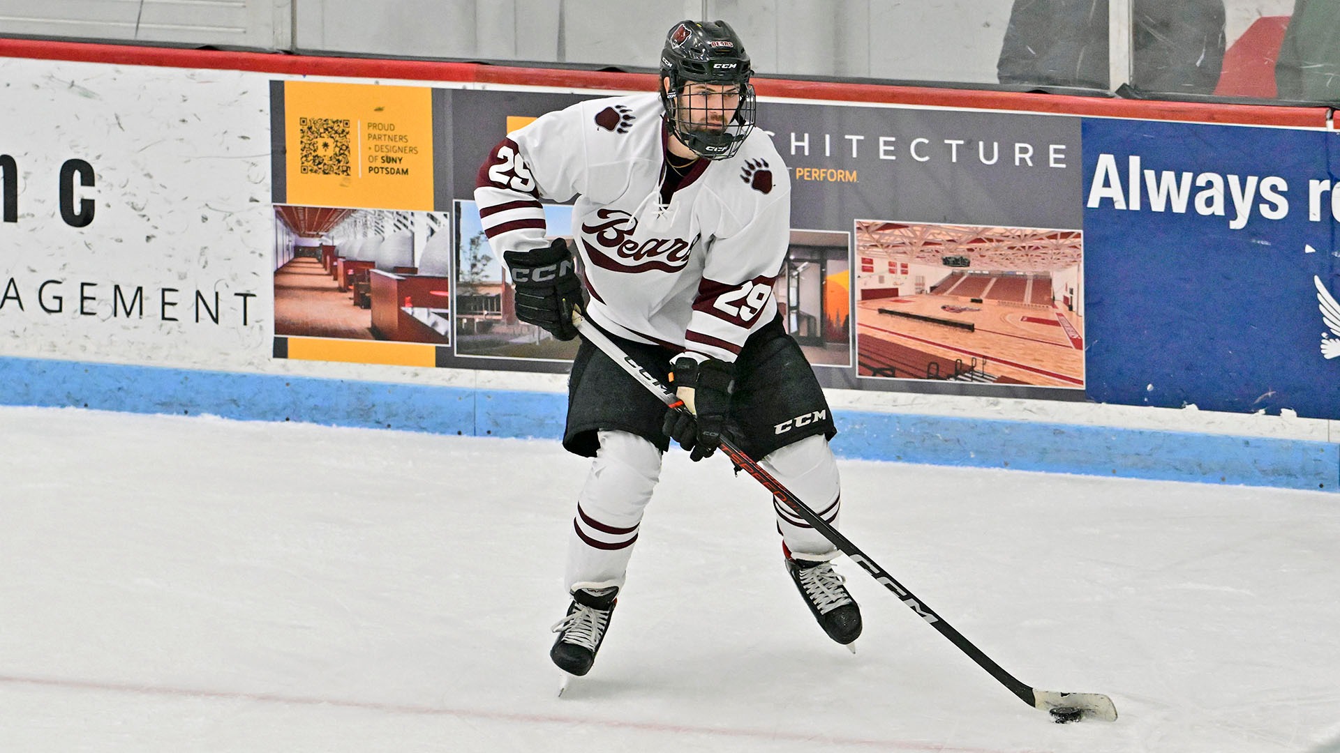 Owen Watson carries the puck against Canton on 11/25/25.