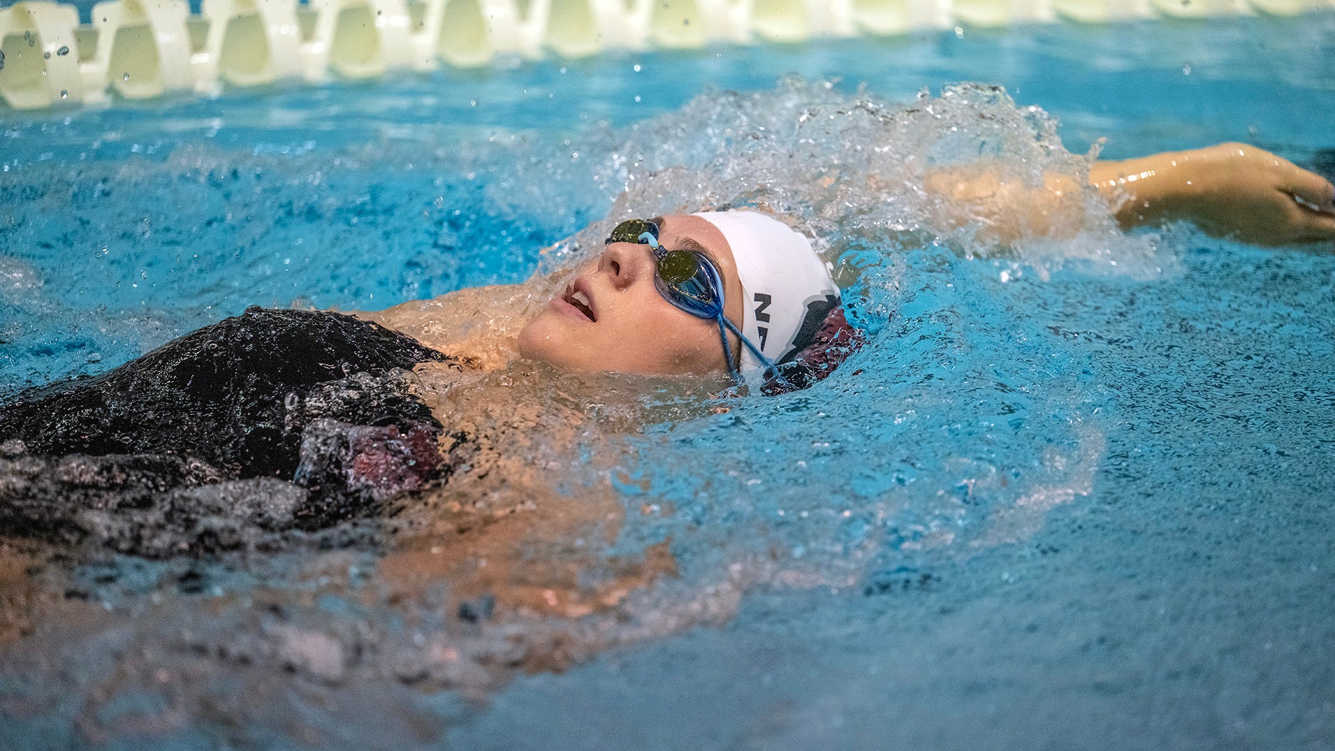 Kathryn Nelson swims during the 2025-26 season.
