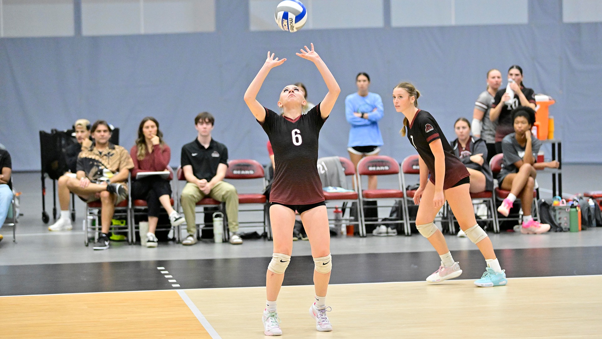 Isabella Miller sets the ball against Johnson on 9/18/26.