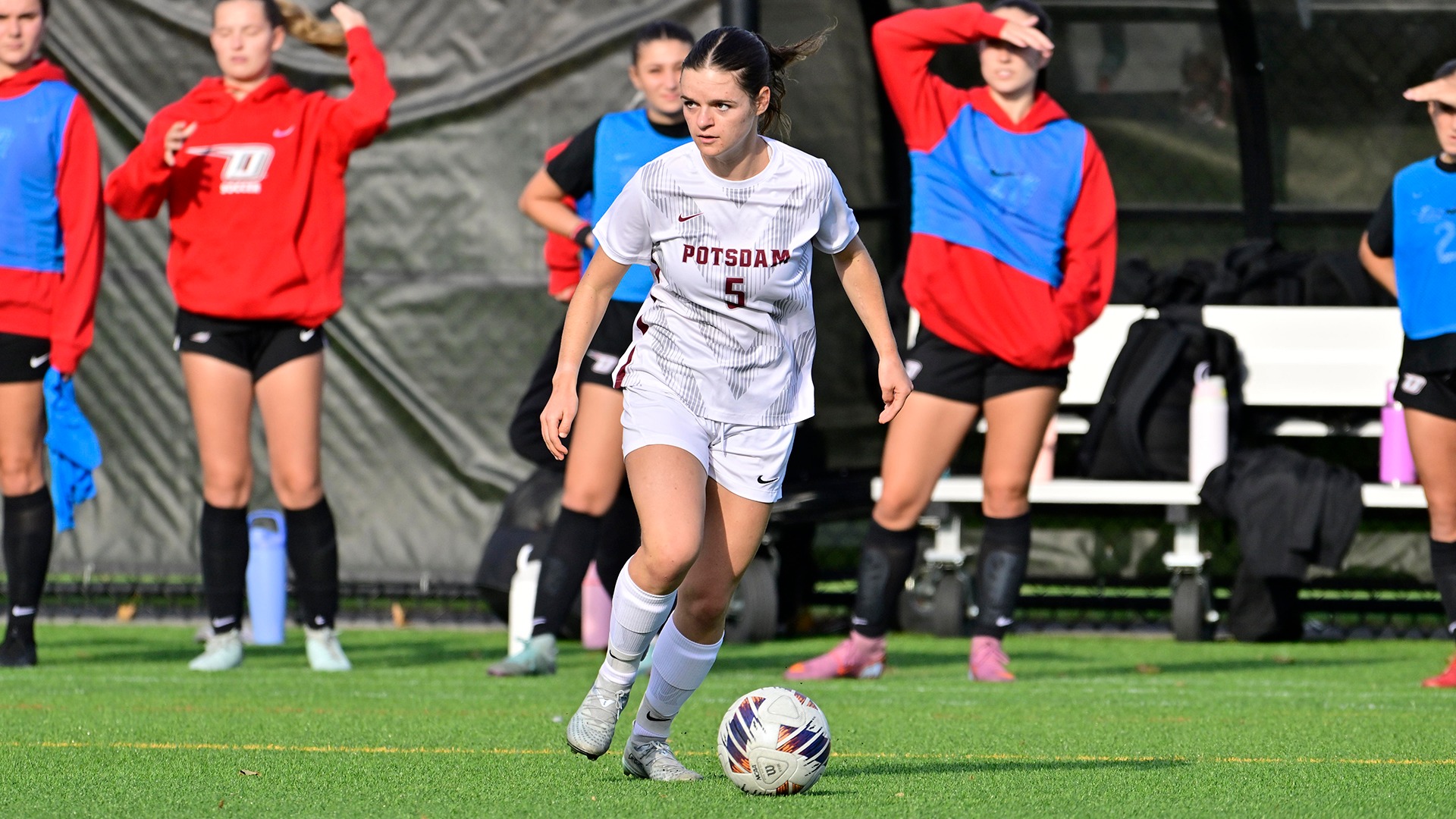 Adrianna Orlando moves the ball against Oneonta on 10/7/26.