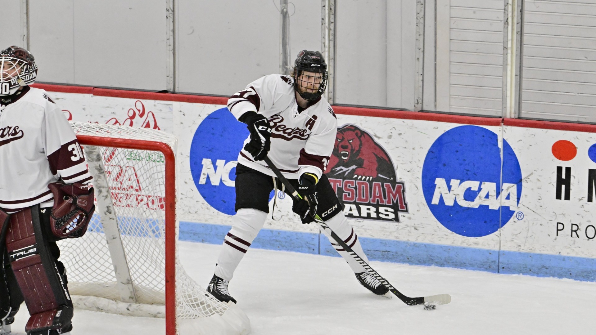 Eli Doughart-Wood controls the puck against Canton on 11/25/26. 