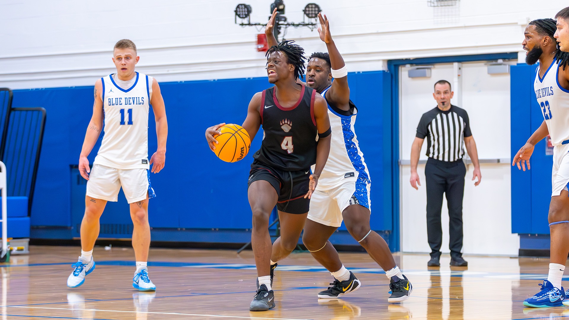 Timothy Hardy moves the ball against Fredonia on 2/13/26.