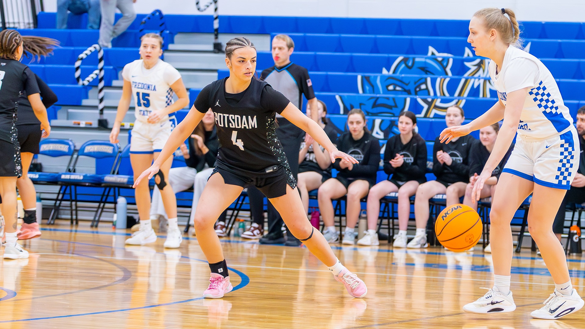 Lucie Scarpine defends at Fredonia on 2/13/26. 