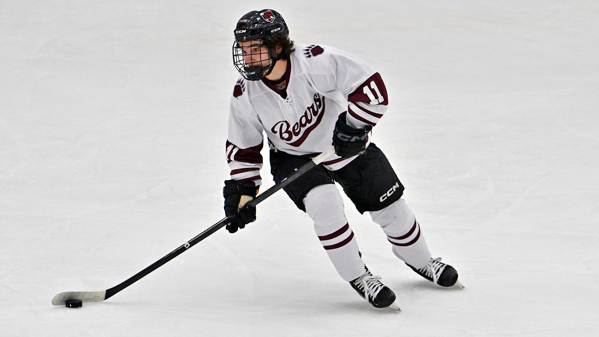 Lucas Salas carries the puck against Canton on 11/25/26.