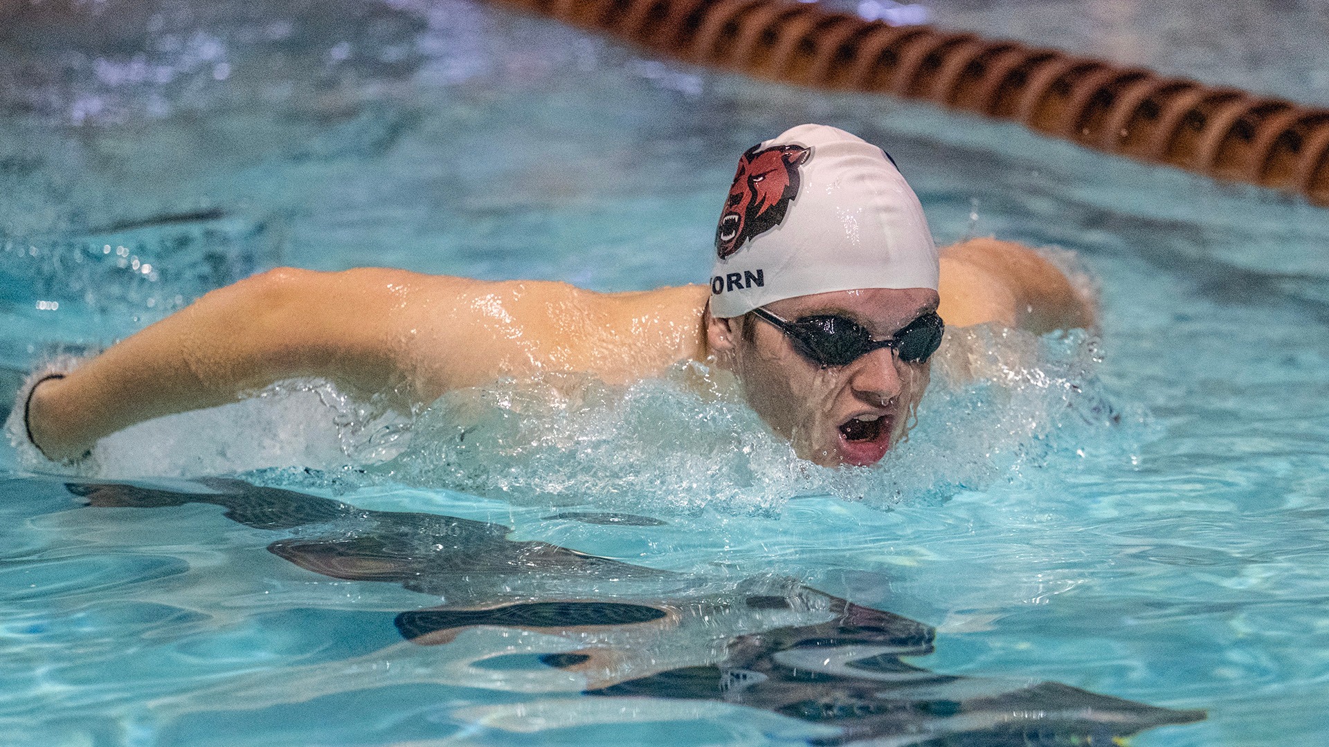 Jackson Korn swims during the 2025-26 season.
