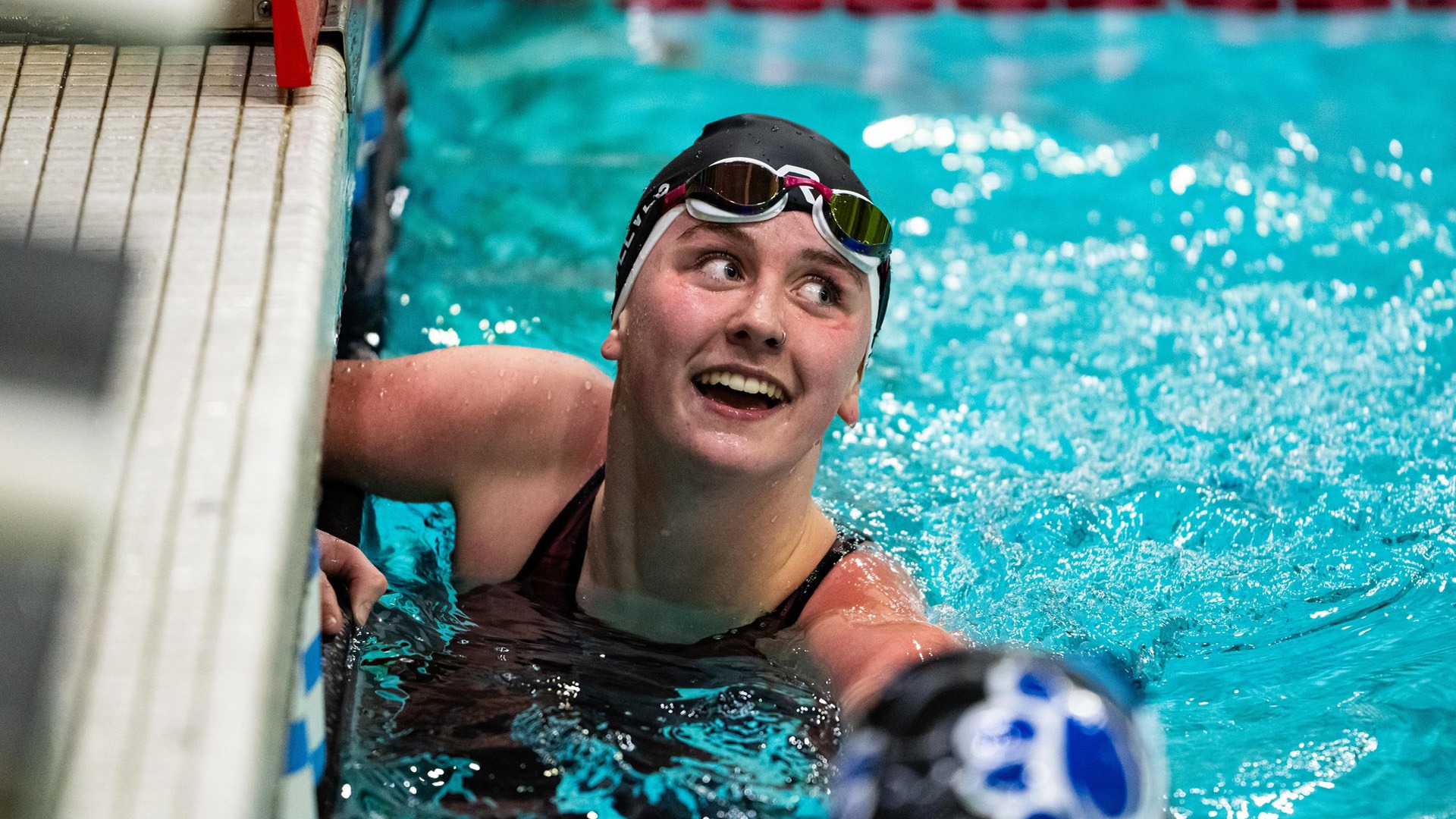 Katherine Steeves checks her time on Day 2 of the SUNYAC Championships on 2/19/26.