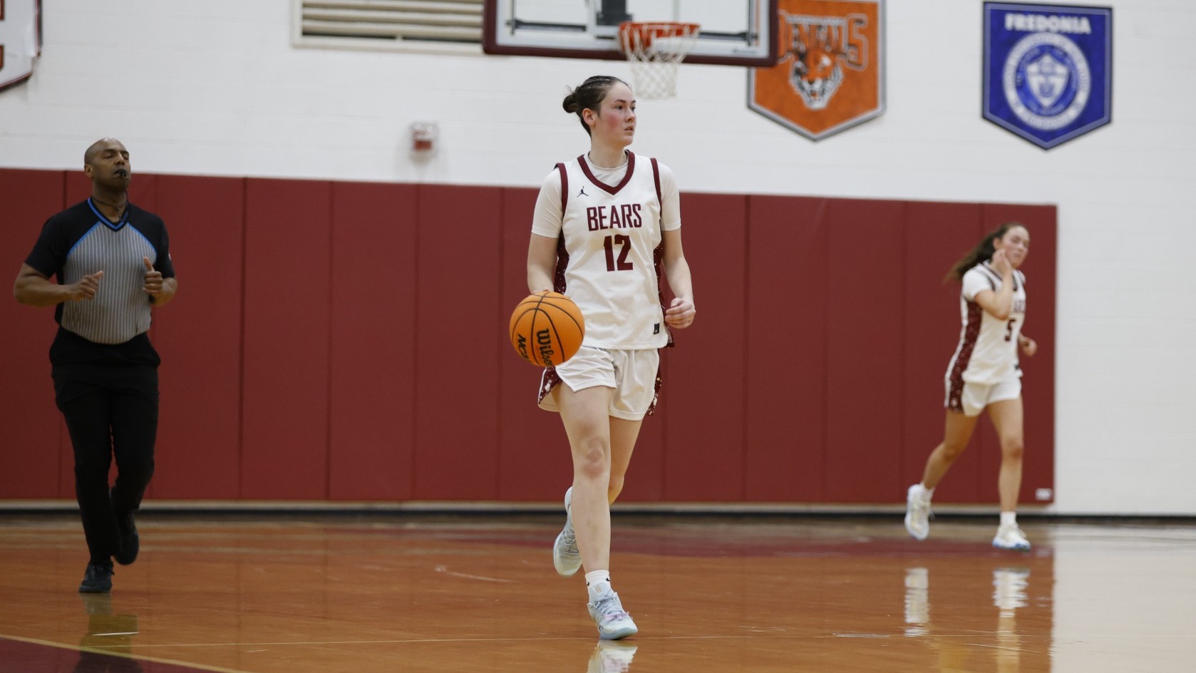 DaeLynn Alcock brings the ball up the floor against Canton on 01/30/26.