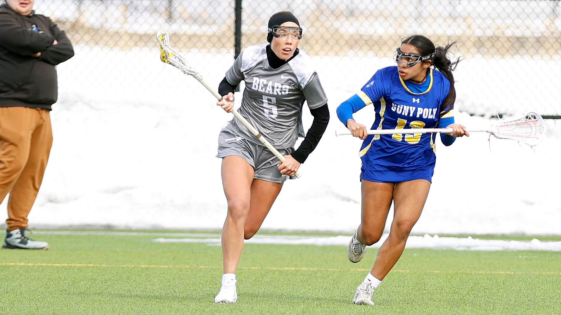 Megan MacWilliams carries the ball against SUNY Poly on 2/28/26.