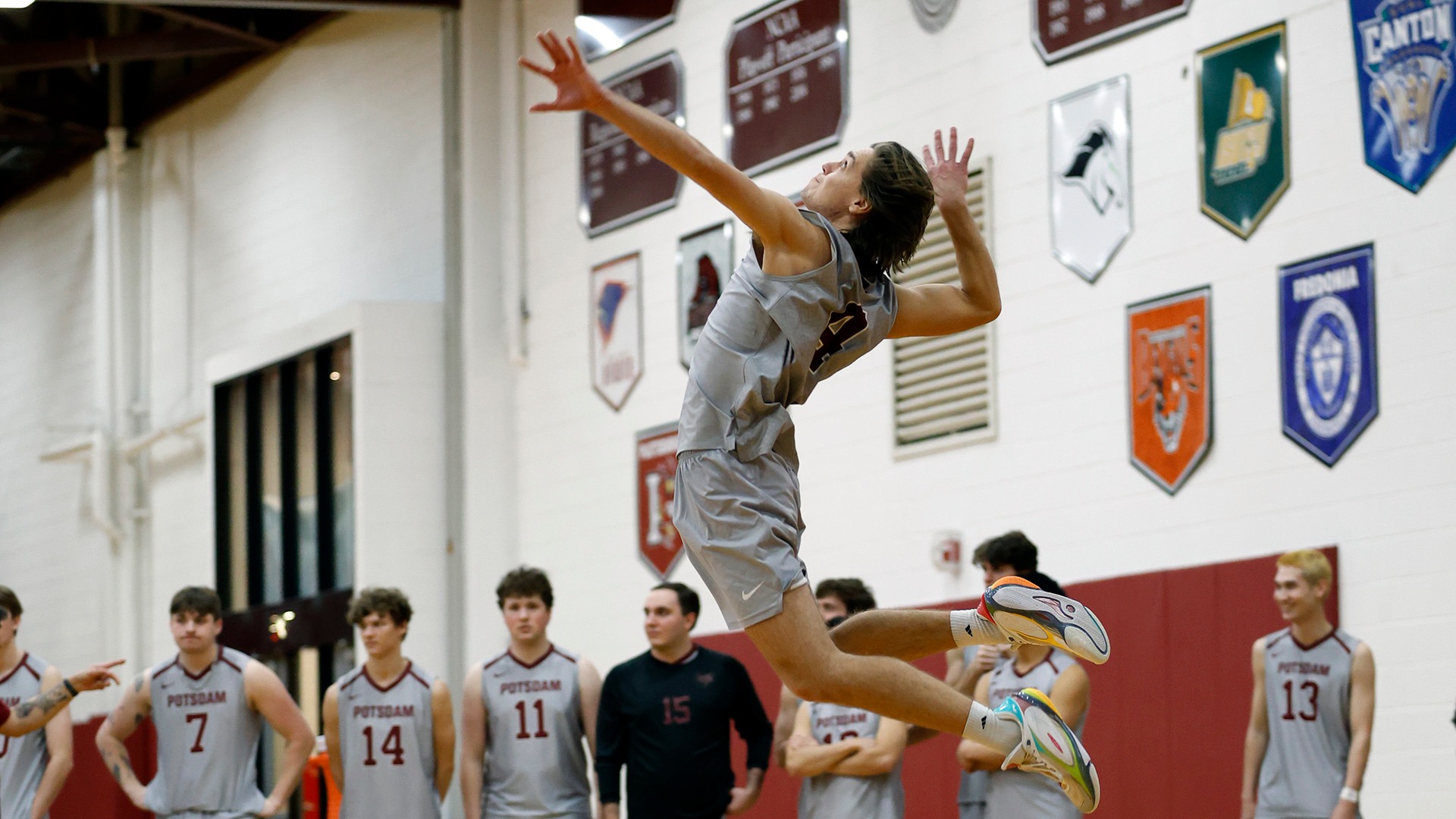 Duncan Tenhagen serves against Houghton on 2/7/26.
