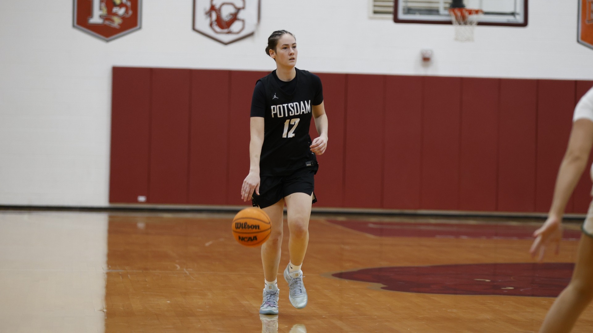 DaeLynn Alcock dribbles the ball up the floor against Oswego on January 31, 2026. 
