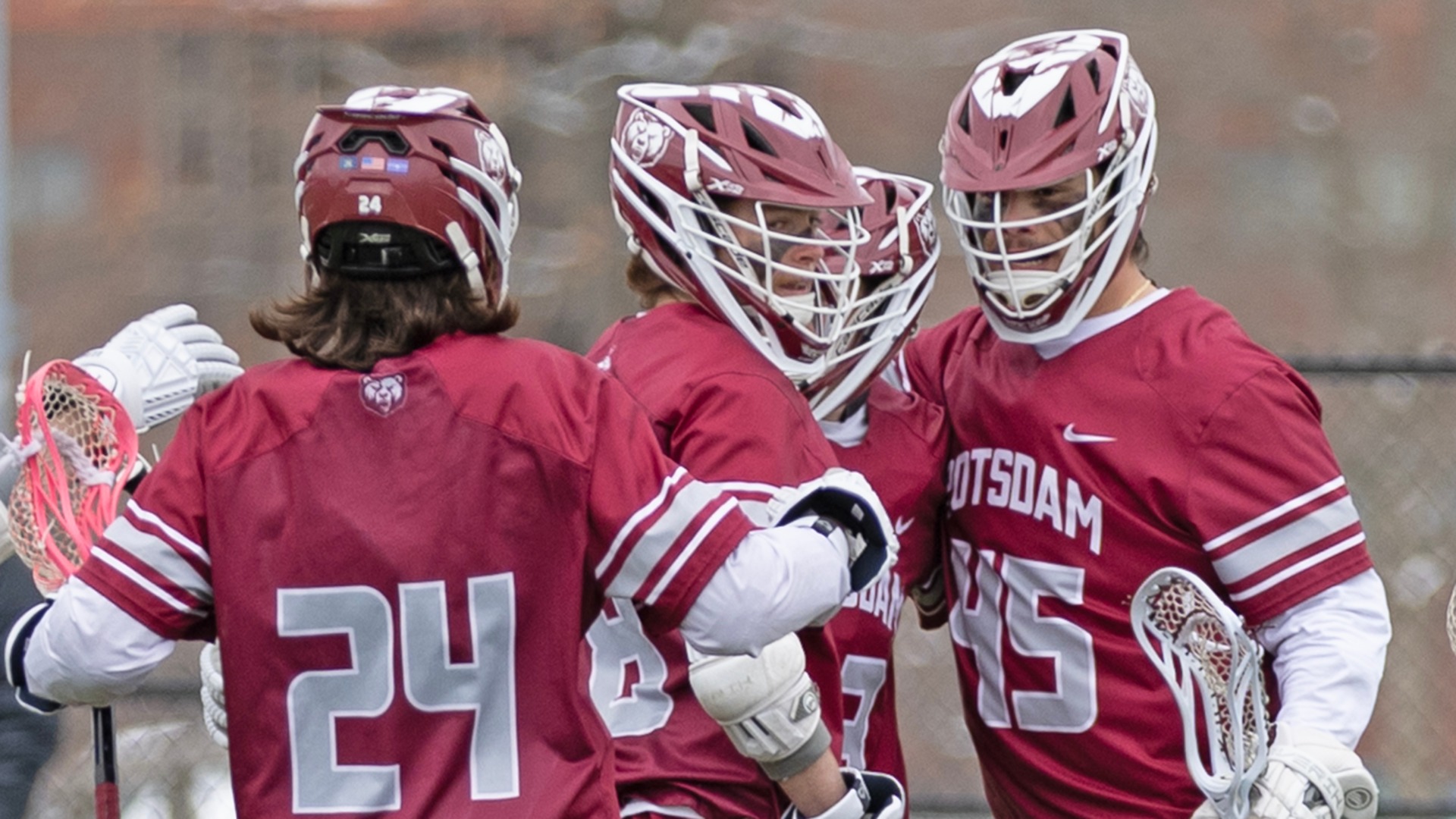 Rowisonkies Barnes celebrates a goal with Ronin Oakes and Billy Kozloski during a game with SUNY Poly on 3/21/26.