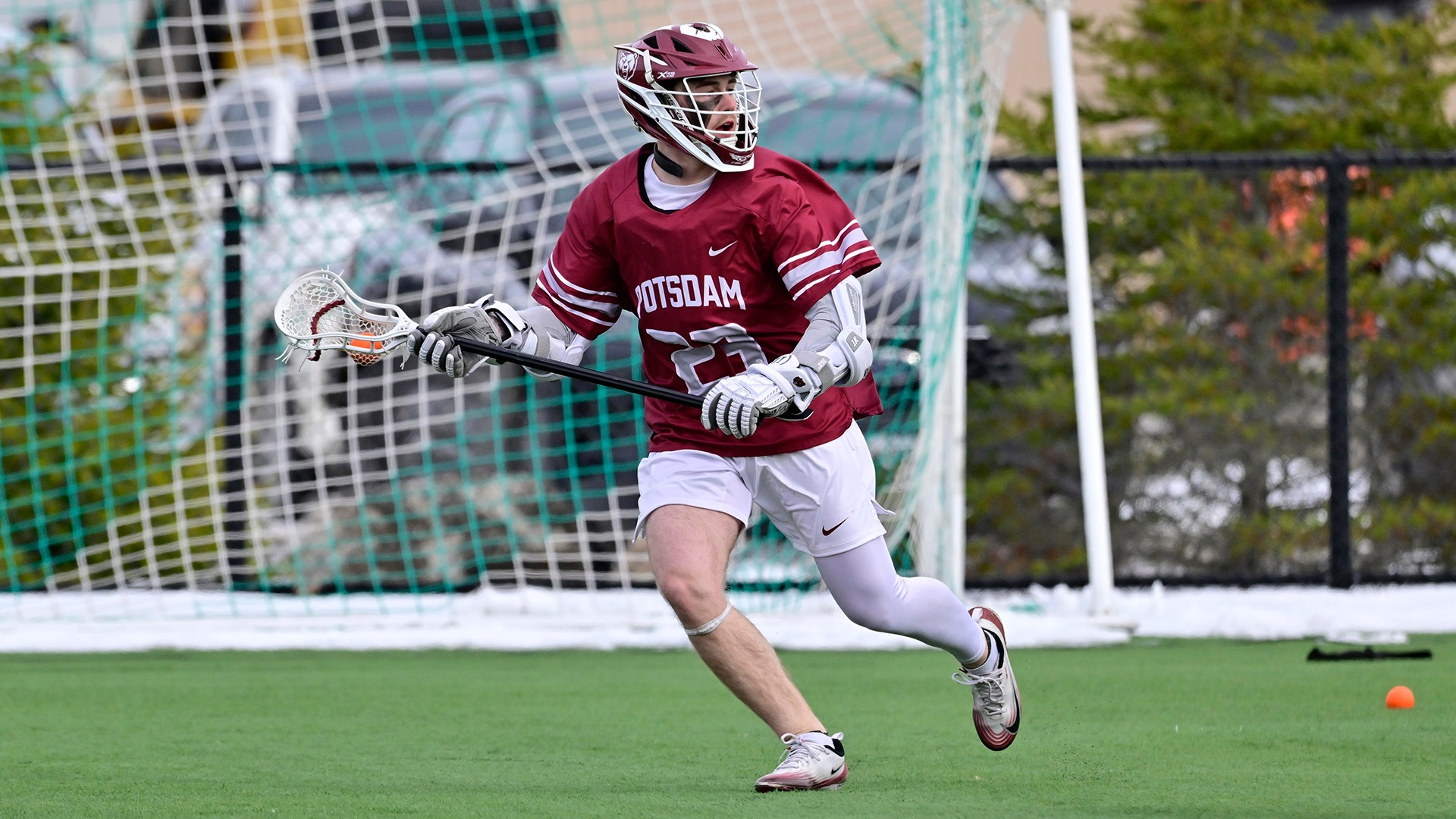 Braydon Goddard carries the ball against Clarkson on 3/24/26.