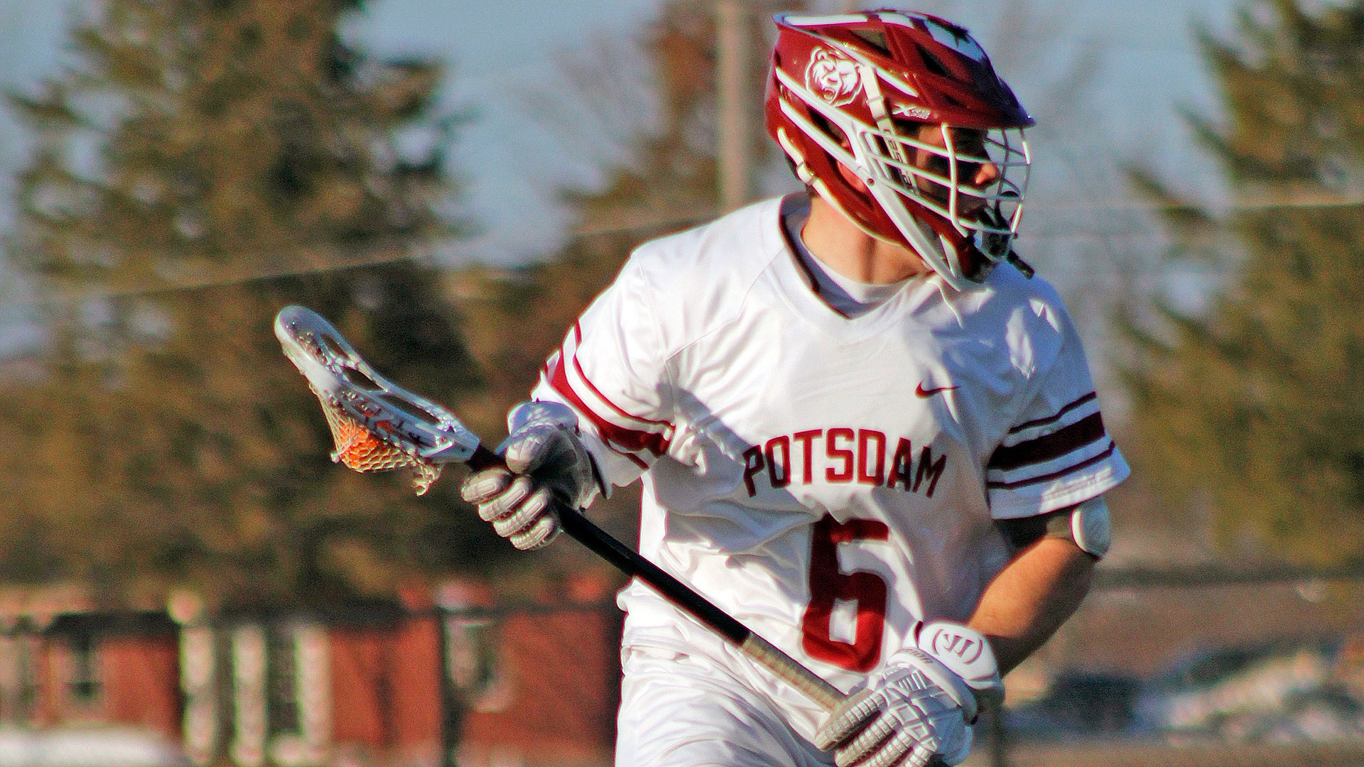 Drew Costello carries the ball down field against Alfred State on 3/4/26.
