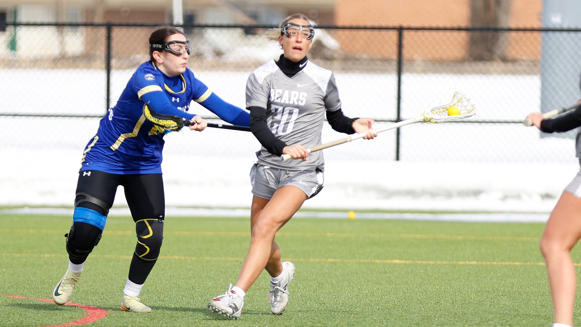 Maggie Akin looks to pass the ball against SUNY Poly on 2/28/26.