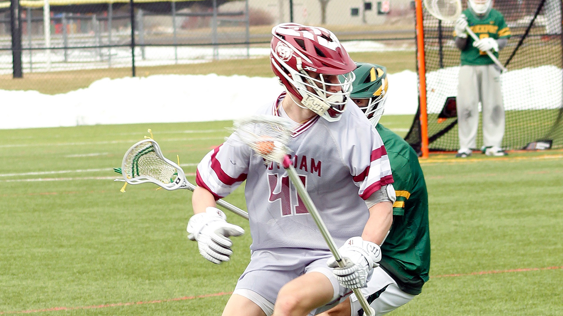 Damyn LeClair carries the ball against Brockport on 3/7/26.