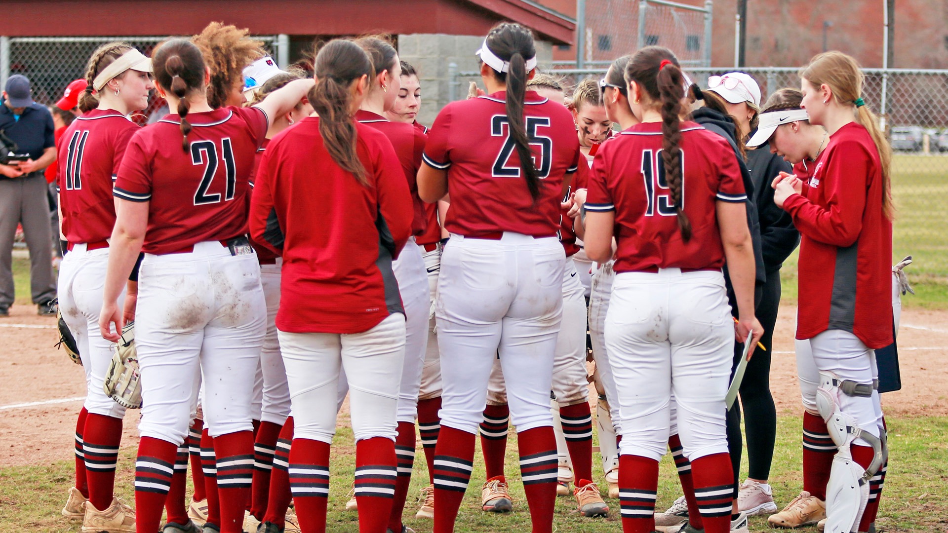The Bears softball team huddles during a game with Cortland on 4/3/26.