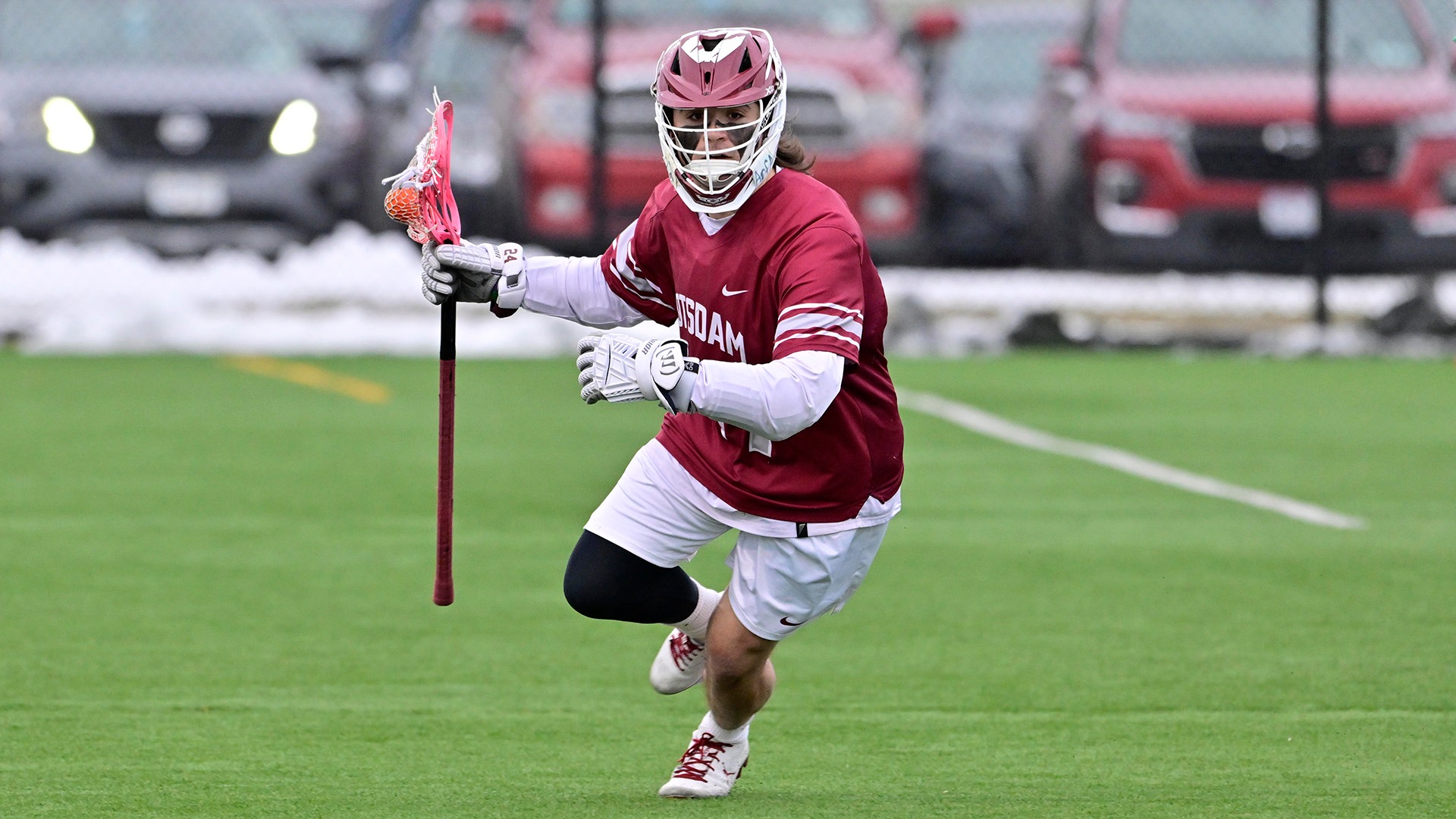 Billy Kozloski carries the ball at Clarkson on 3/24/26.