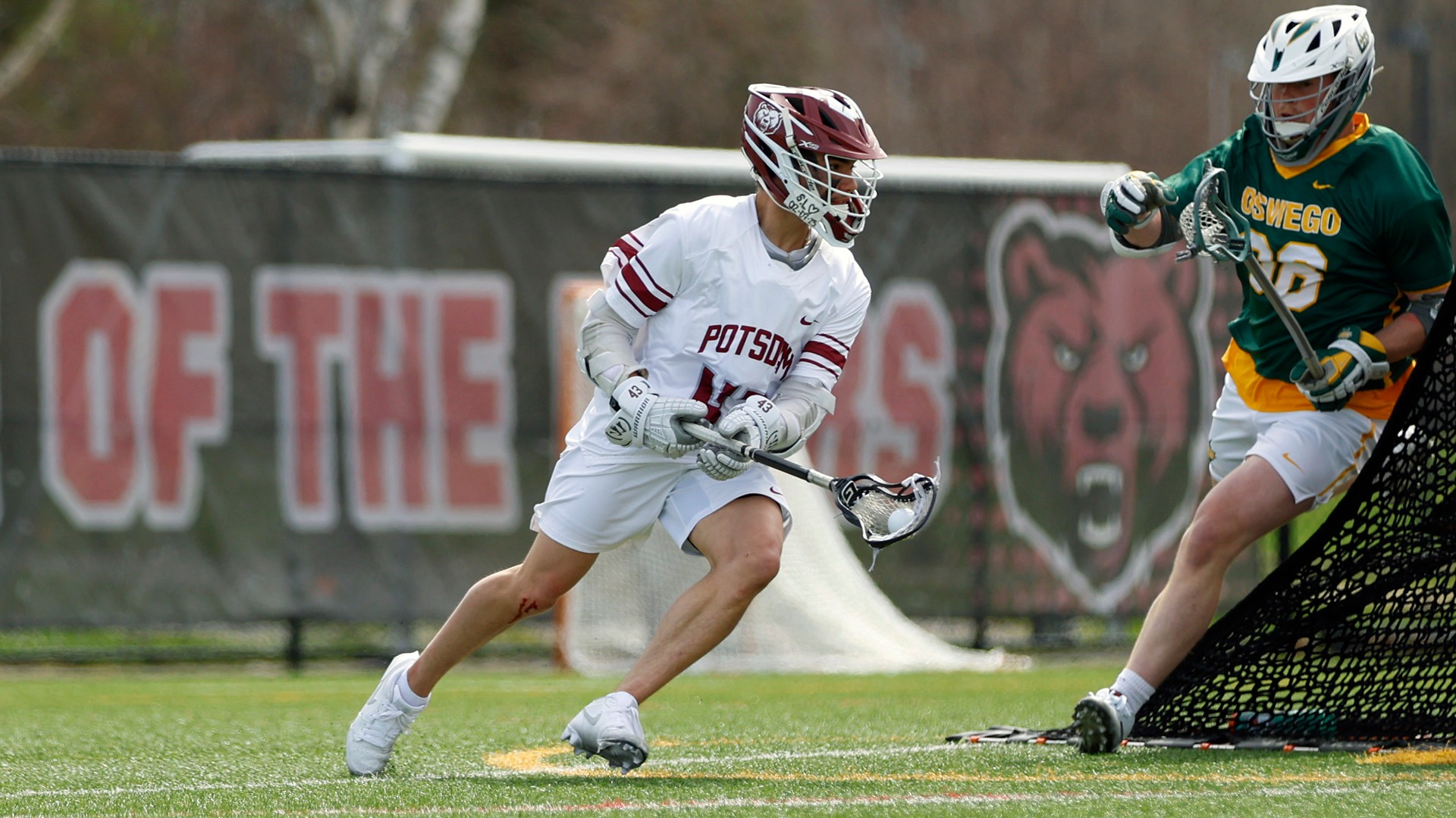 Ronin Oakes drives to the net against Oswego on 4/25/26.