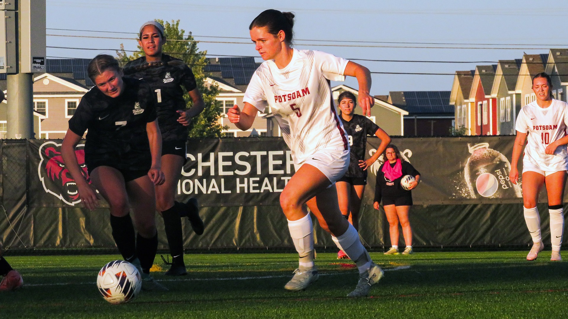 Adrianna Orlando moves the ball against Paul Smith's on 9/11/26.