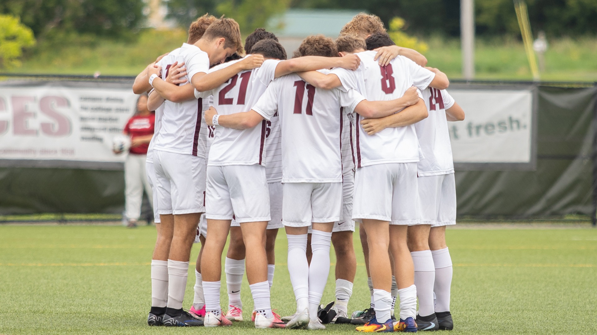 The SUNY Potsdam men's soccer team huddles during a game with Keuka on 9/5/26. 