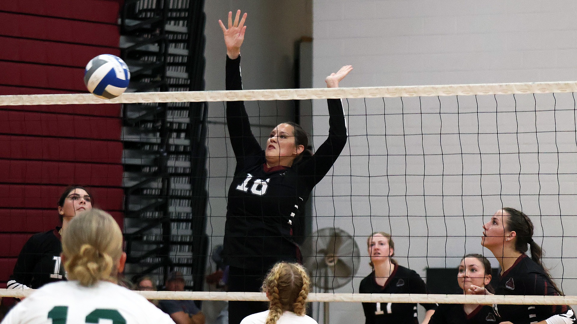 Noelle Redeye blocks the ball against Fredonia on 10/24/25.