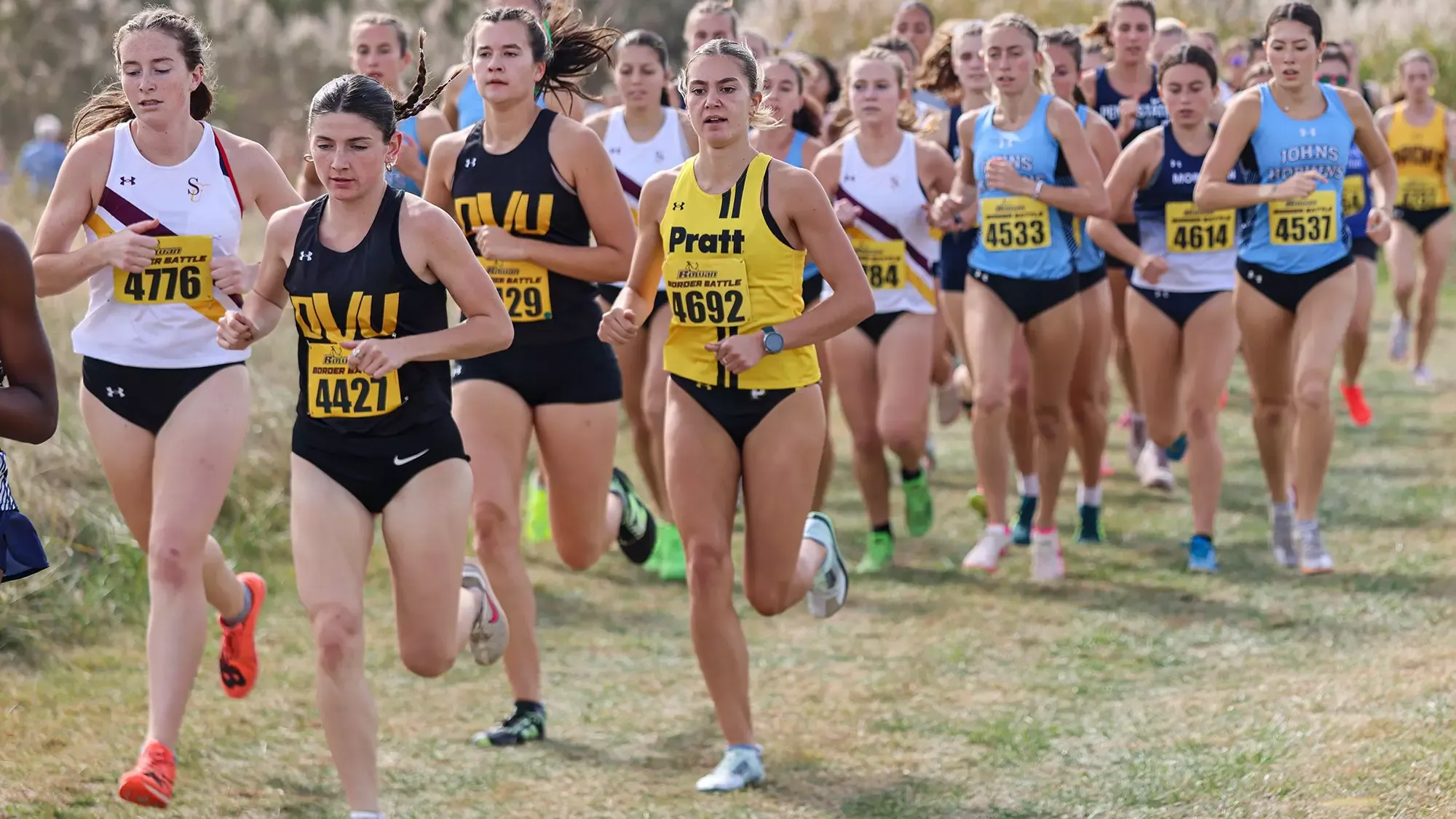 Melis Kavlicoglu runs in a pack at the Rowan Border Battle