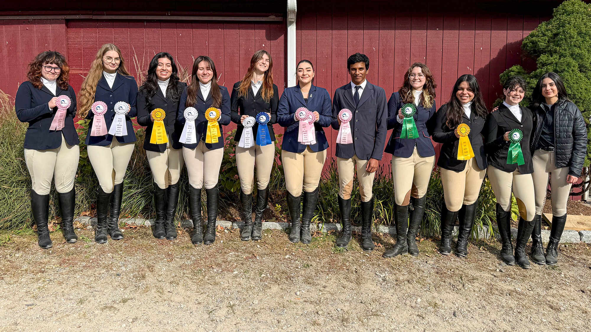 The Equestrian Team poses with their ribbons after the Sacred Heart/Fairfield Show