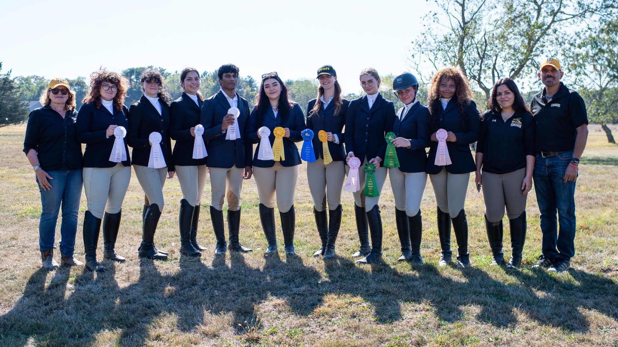 The Equestrian team poses with their ribbons at the St. Joseph's Show
