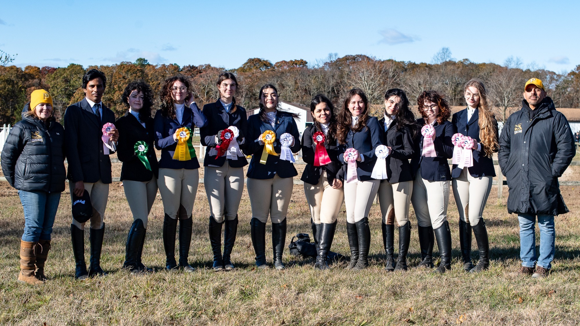 Equestrian Team poses with their ribbons at the Stony Brook show