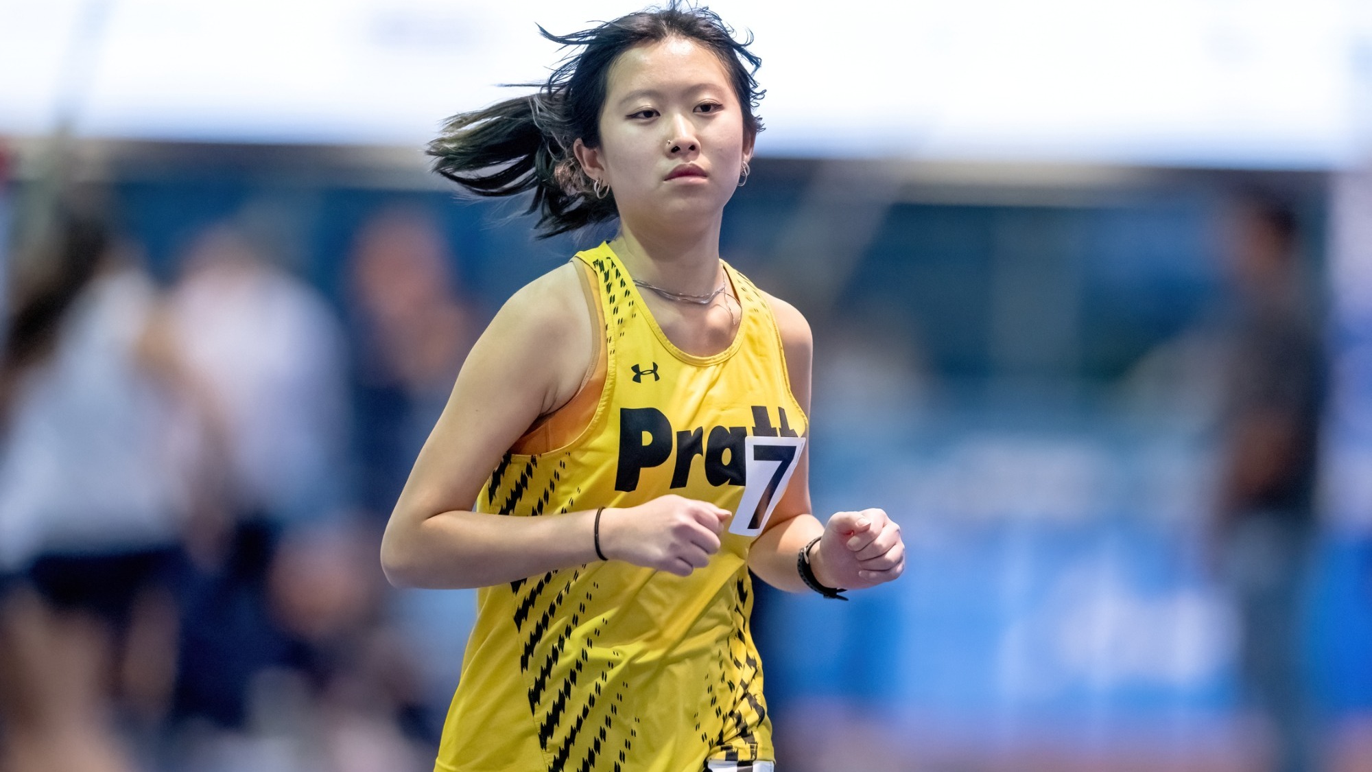 Kathleen Chen runs in the 1000-meter run