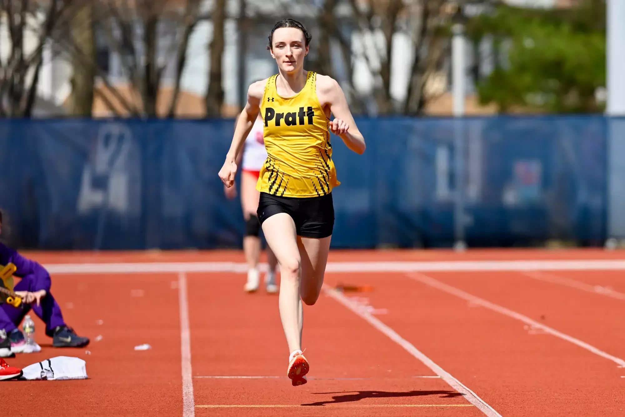 Kaeden Green runs down the runway in the long jump