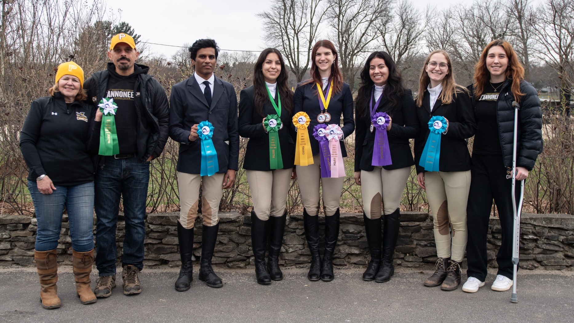 The Pratt Equestrian team poses with their ribbons after the IHSA Regional Finals