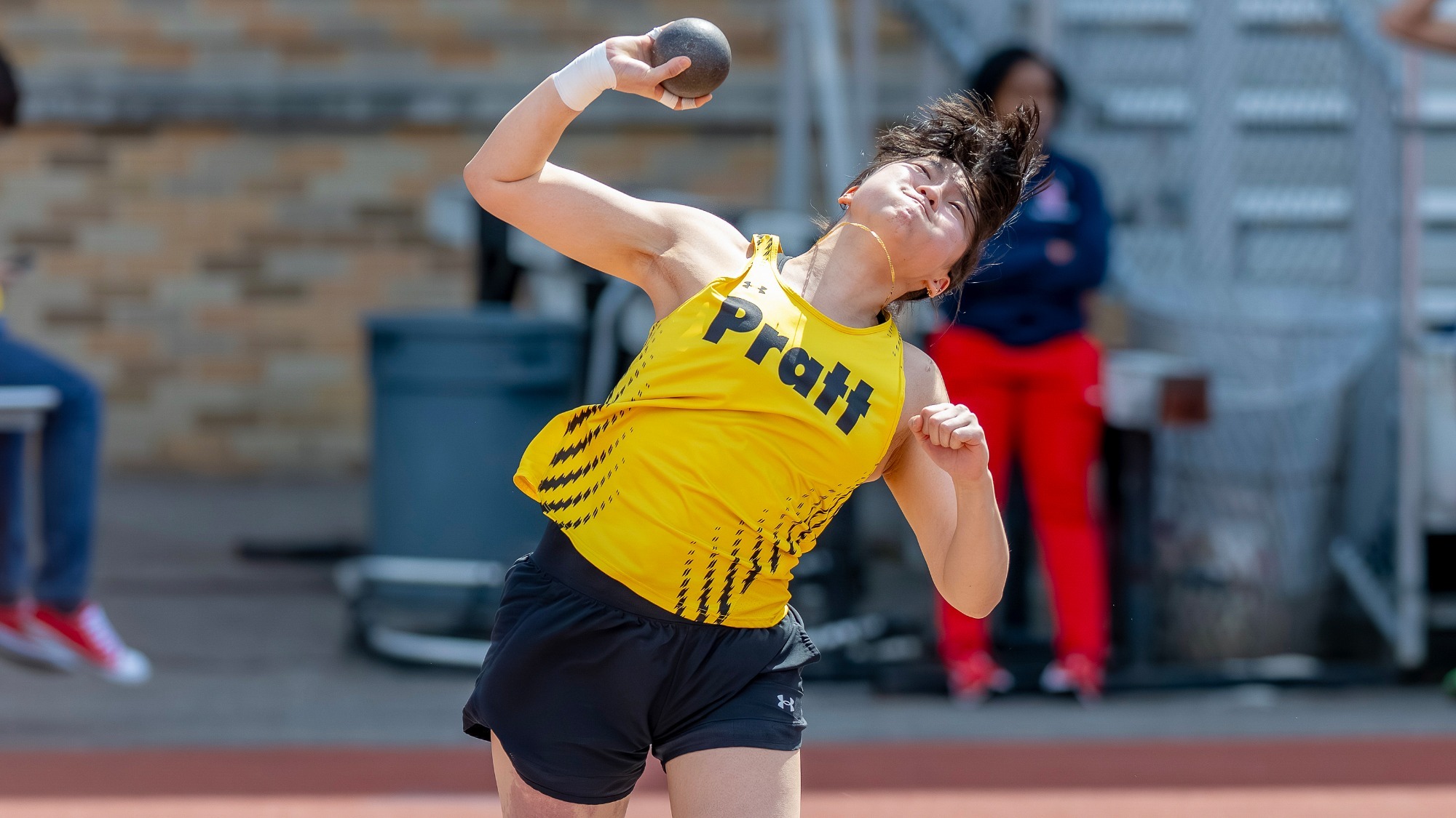 Hannah Kim throws the shot put at the Big Hurt Invite