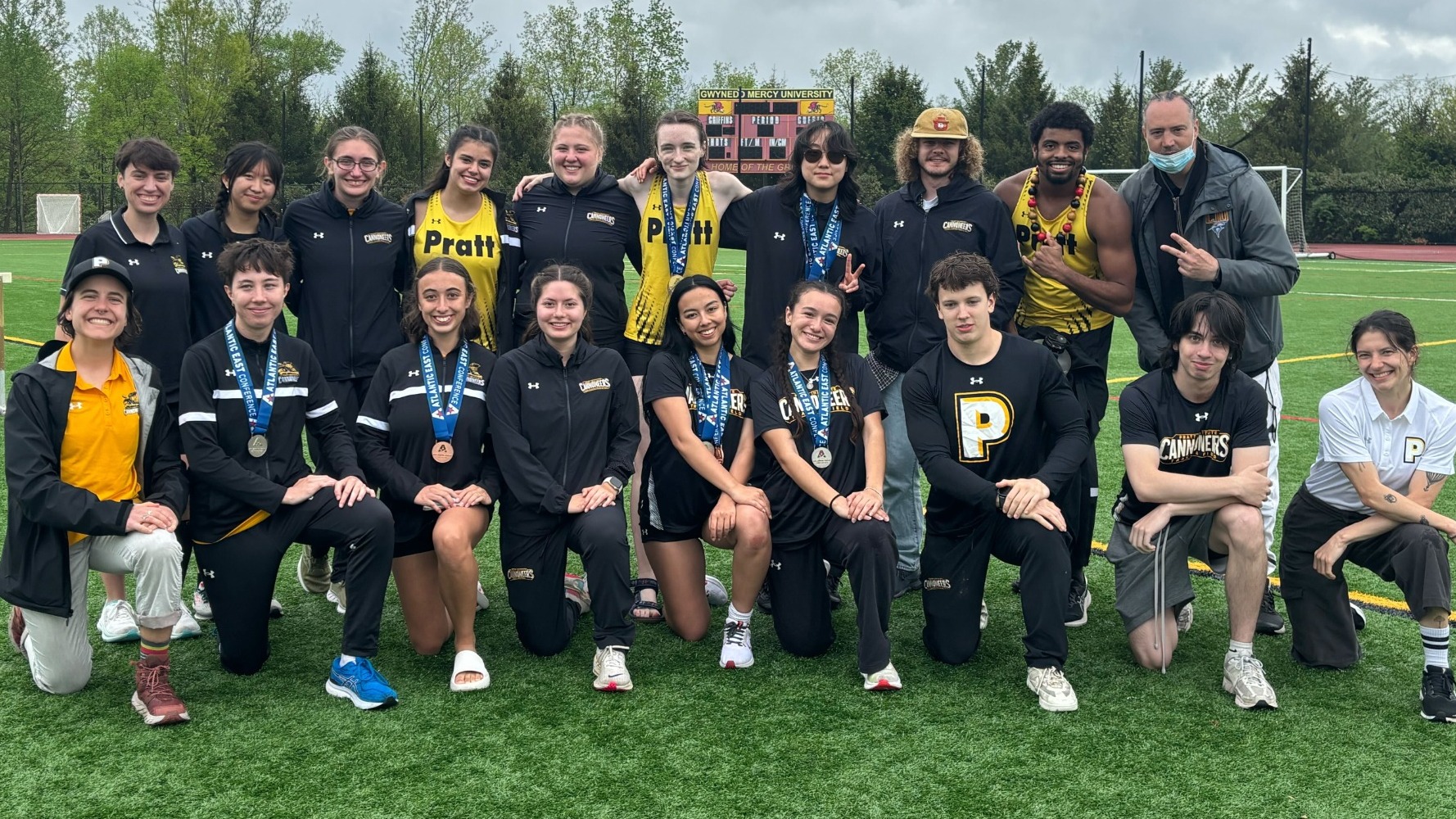 Pratt track and field poses for a team photo after the 2025 AEC Championships