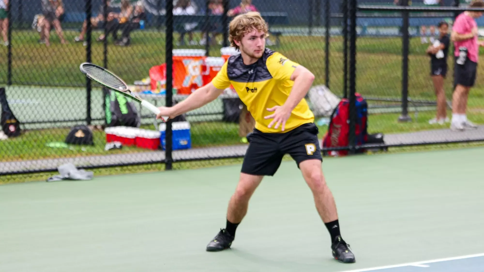 Wyatt Myers prepares to hit a forehand from the baseline