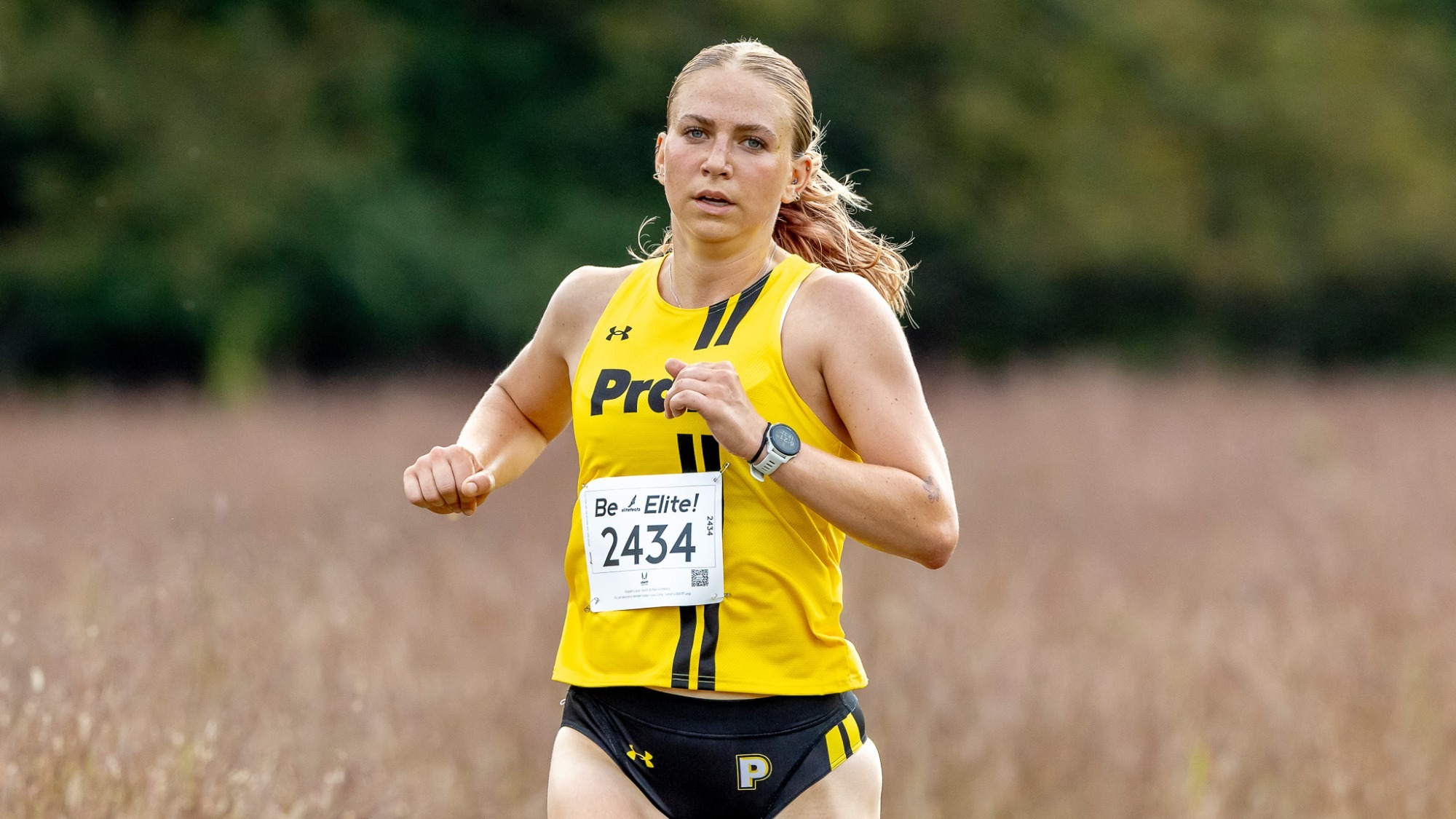 Coralie Norenberg runs at the Golden Eagle Invite