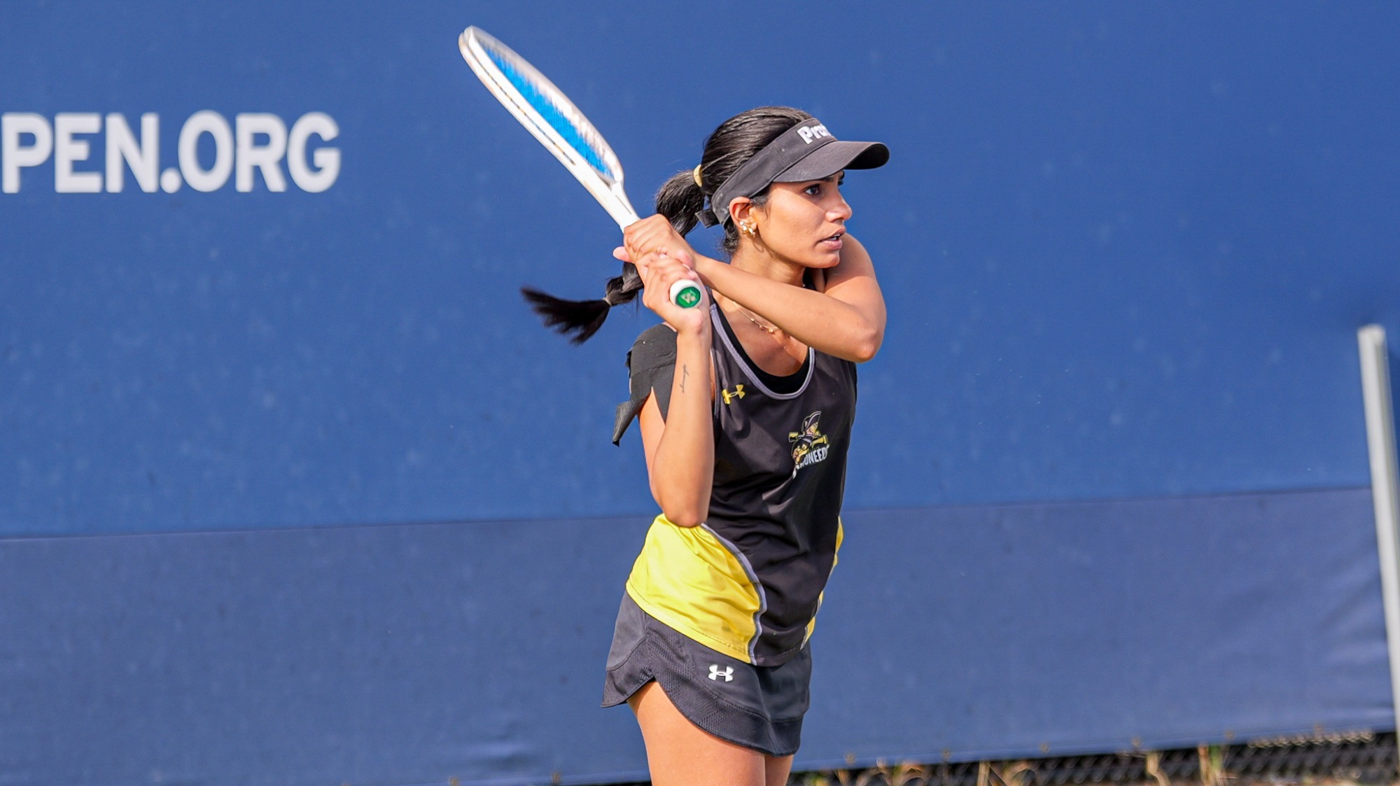 Pallavi Verghese hits a backhand.